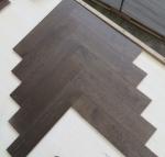 dark stained White Oak herringbone/fishbone engineered wood flooring