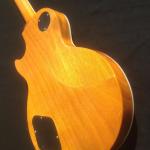 Standard LP electric guitar with gold hardware and flower inlay