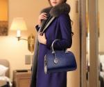 2016 new European and American fashion handbags serpentine Messenger bright skin
