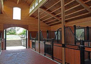 Quality Black Powder Coating Modular Horse Stalls , Bamboo Infill Premade Horse Stalls wholesale