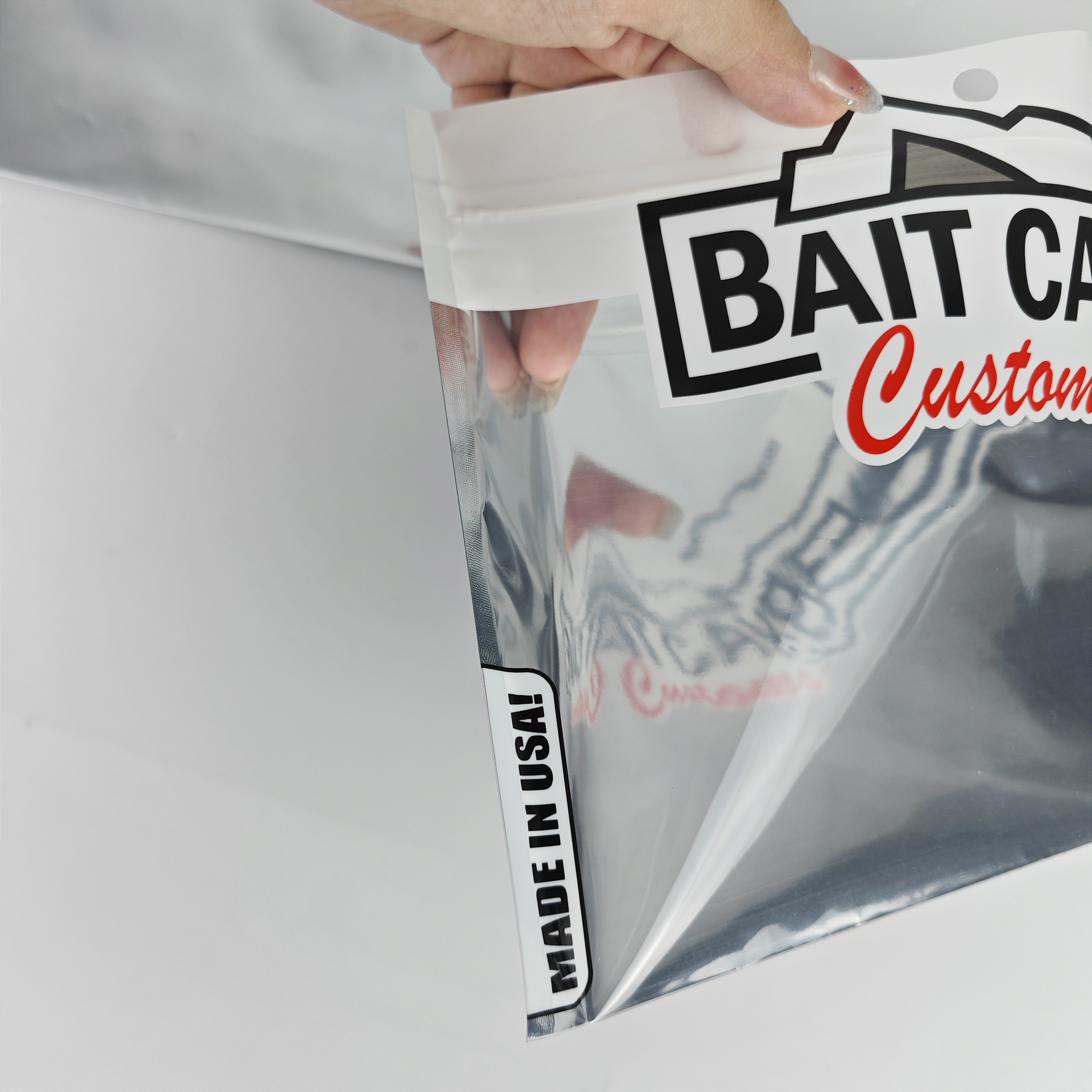 Custom printed resealable front clear back foil pouch smell proof fish bait packaging ziper bag with euro hole