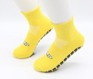 Quality Yellow Color Trampoline Grip Socks Polyester Non Slip Socks Jacquard Logo wholesale