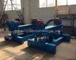 Up and down welding rotator