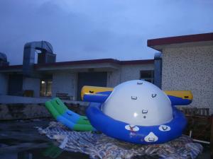 Quality Best Selling 0.6mm Pvc Tarpaulin Inflatable Water Saturn Rocker For Water Games wholesale