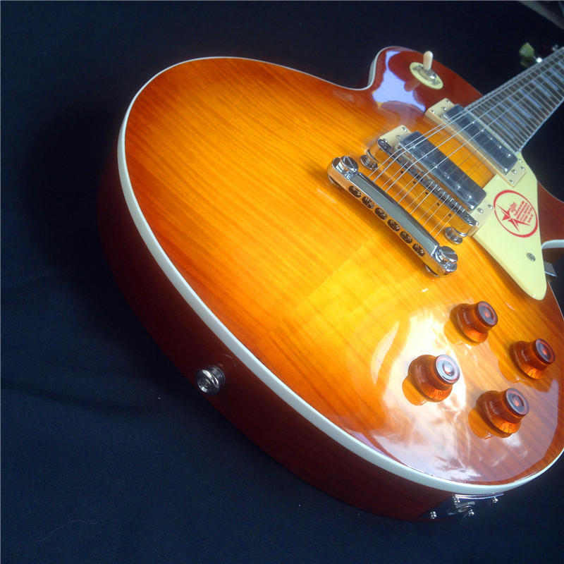 Standard LP electric guitar with gold hardware and flower inlay