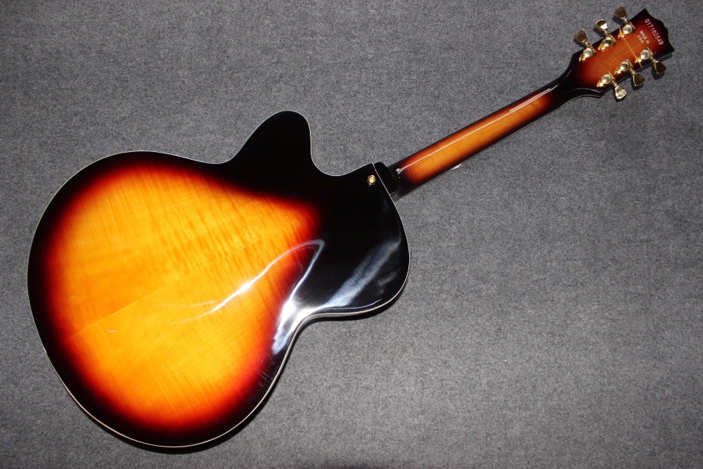 Custom Electric Guitar Quilted Maple Top & orange double F hole Mahogany Body Neck