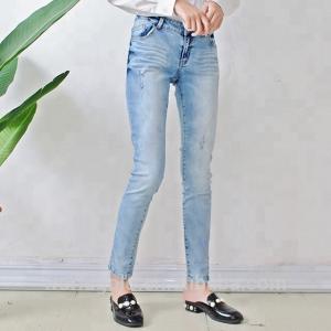 China Stretch Whisker Distressed Women Denim Skinny Jeans Light Blue Custom Size on sale