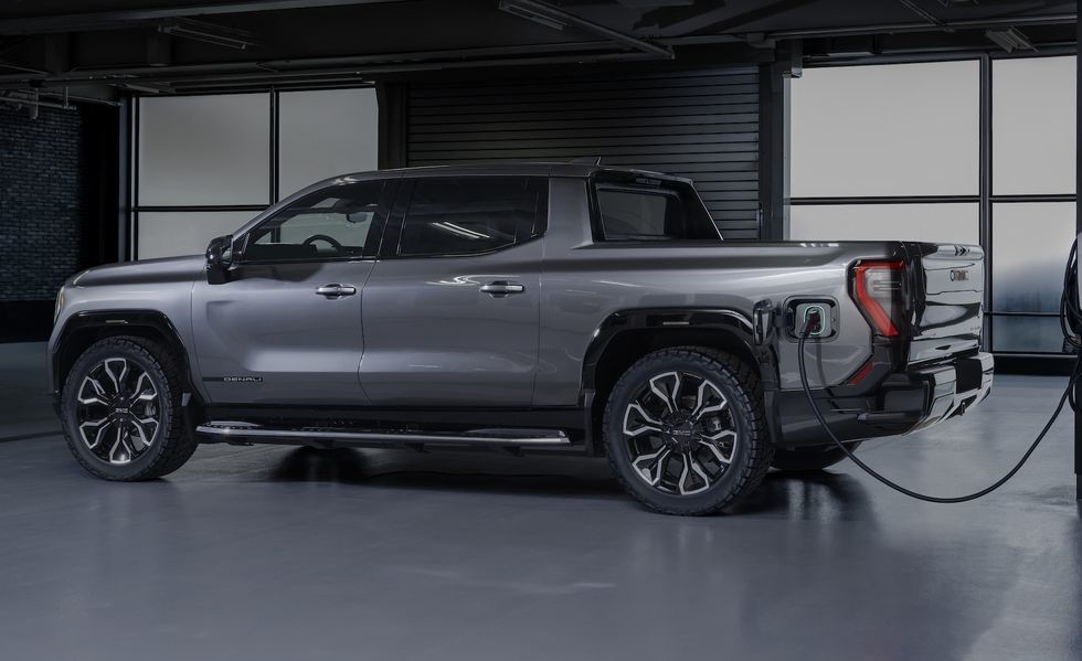 GMC Sierra EV dual motor powertrain with 754Ps rated to tow up to 9500 pounds and can haul up to 1300 pounds of payload