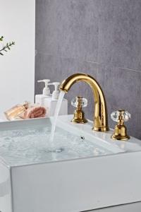 Quality Electroplate Double Handle Rose Gold Wash Basin Faucet wholesale