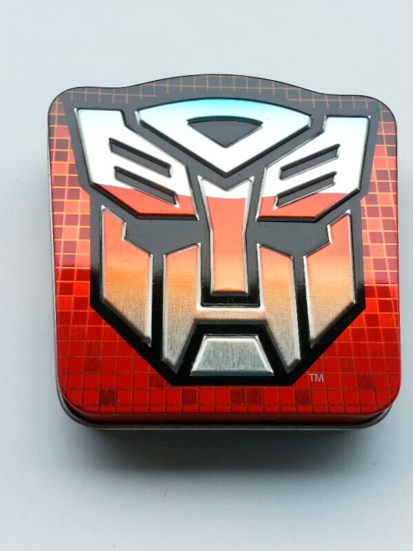 Transformer Shield Tin Candy Containers Size : 82*82*15mm For Small Sweet Food Packaging