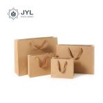 Thicken Ribbon Handle Paper Bag , Moistureproof Packaging Bags For Cosmetics
