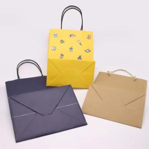 Quality Kraft Paper Packaging Bag Gift Crafts Shopping Biodegradable Bag With Twisted Handle wholesale