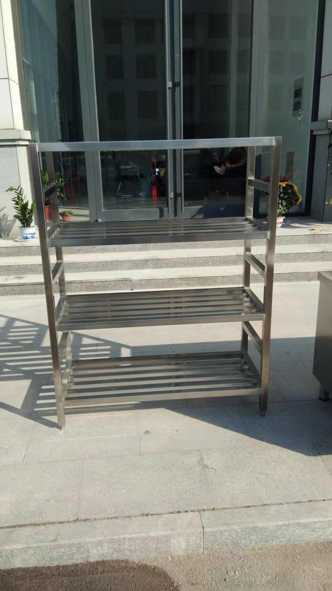 stainless steel shlf 4 levels made it as assembled and each one level can be adjusted