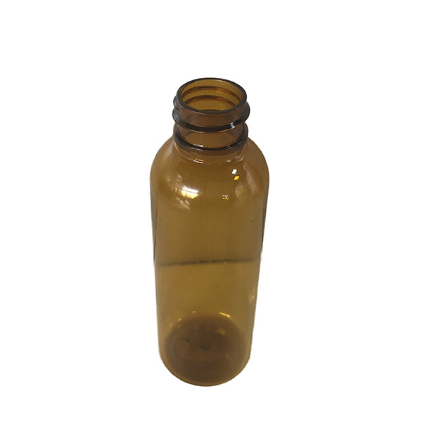 2 Oz Round Squeezable Clear Brown PET Bottle With Spray Pump 20/410