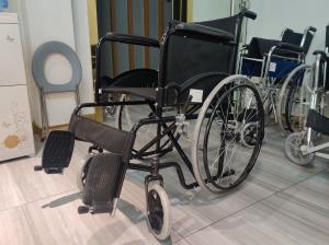 Quality Fixed Armrest Folding Steel Wheelchair Weight Limit 100kgs wholesale