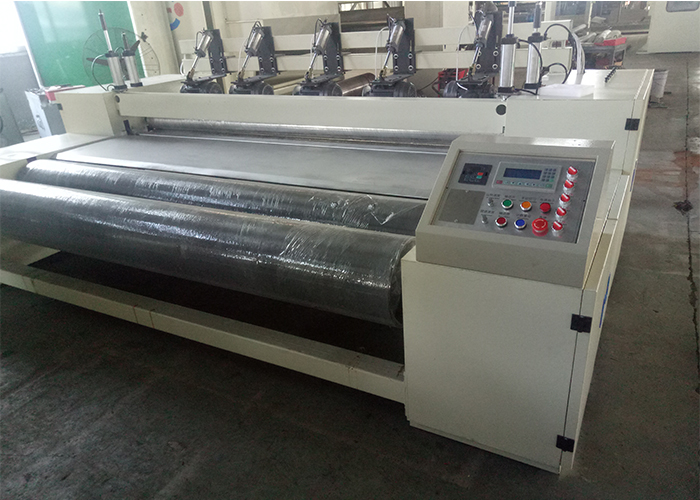 NON-WOVEN FABRIC EDGE CUTTING MACHINE