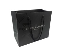 Quality High End Custom Printed Paper Bags / Black Paper Gift Bags Embossed Surface Disposal wholesale