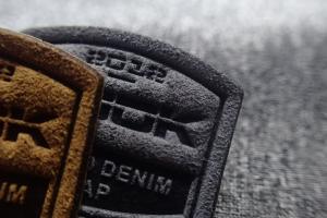 Quality 3D Snow Suit Micro Fiber Woven Clothing Labels Embossed Patches wholesale