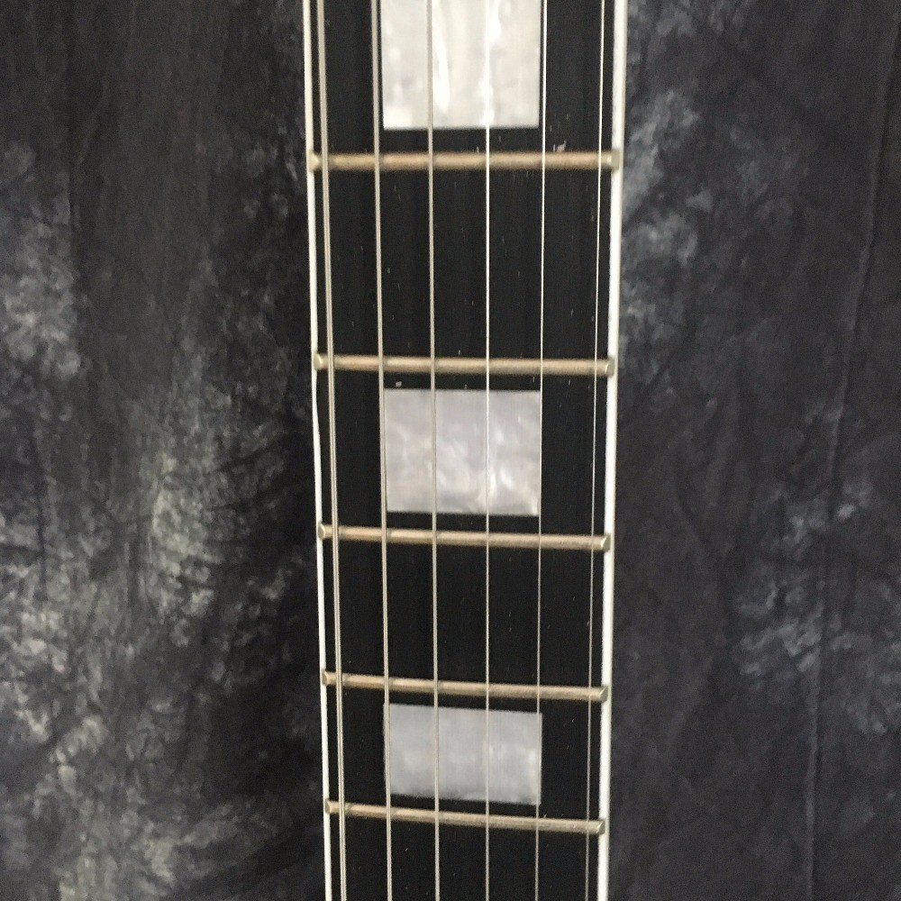 China Flying V Guitar. electric guitar. Good sound quality flying v electric guitar natural color
