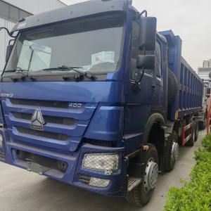 Quality SINOTRUK BLUE HOWO 400HP 8×4 TIPPER DUMP TRUCK LHD wholesale