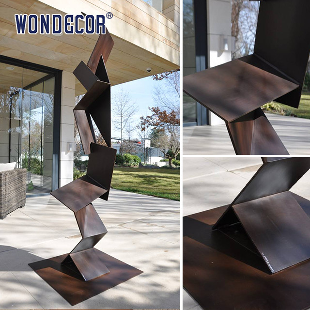 Large outdoor metal art, irregular geometry, weather resistant steel sculpture