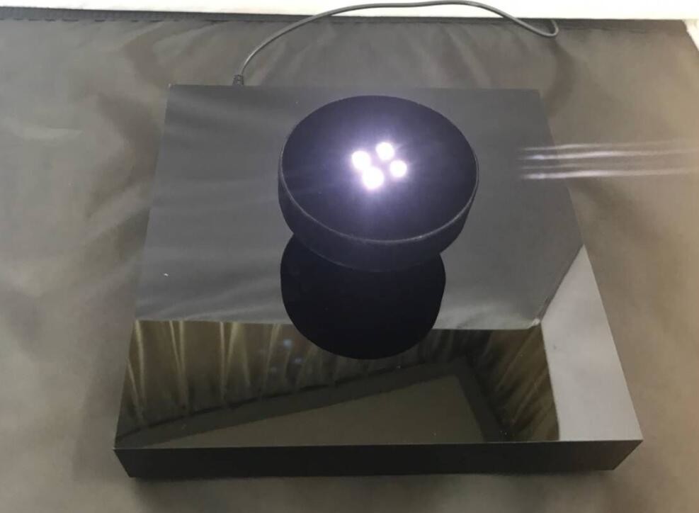 wireless charging rechargeable levitation floating bottle display stand with inducation tray