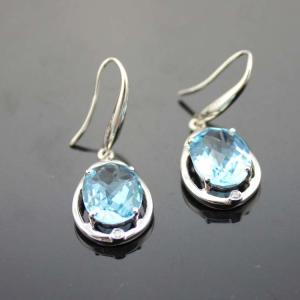 Quality 925 Sterling Silver Oval Blue Topaz Cubic Zircon Dangle Earrings (PSJ04195) wholesale