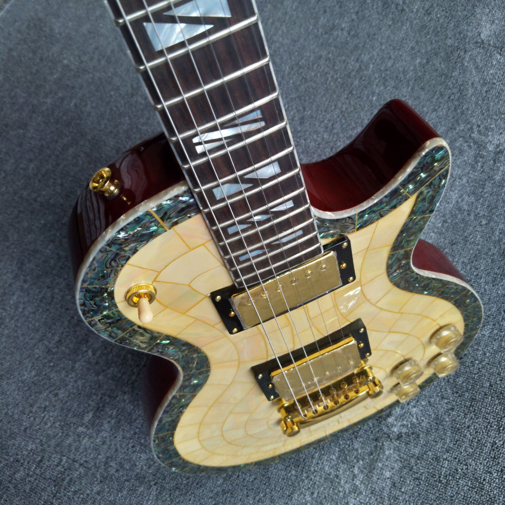 New arrival shell electric guitar with 6 strings guitar and gold pickups