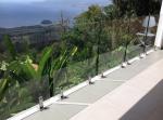 Round Steel Frameless Glass Balcony Railing Outdoor With Solid Wood Handrail