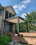 Small patio garden shutters with retractable awning