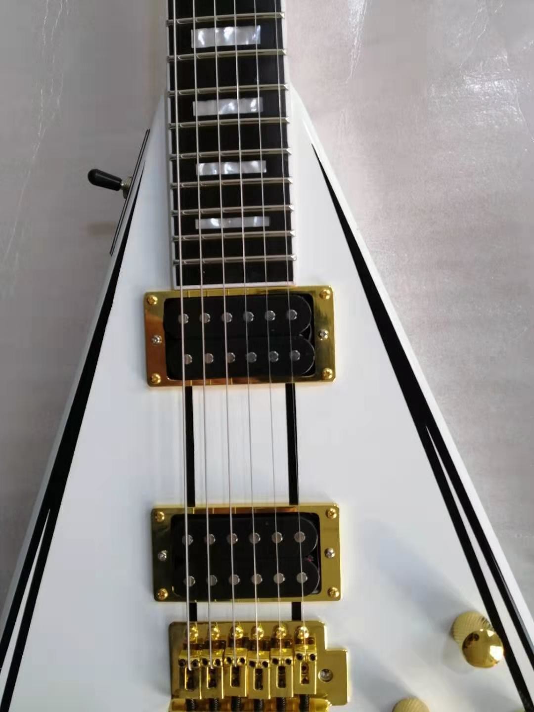 V shape 6 string electric guitar, white body, gold hardware, Fingerboard ebony, free shipping