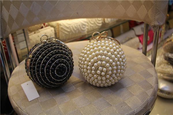 Round high-grade pearls evening bags woman holding a high-end fashion evening