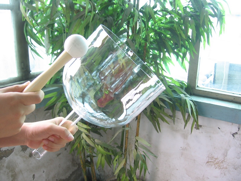 Hand held quartz singing bowl