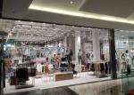 MDF Painting And Iron Metal Clothing Shop Display Stands For Fashion Shop Decor