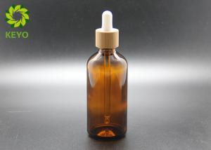 Quality Boston Round Amber Glass Lotion Bottles With Bamboo Dropper In 30ml 1 Oz wholesale