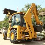 4 Wheel Drive Backhoe Loader Equipped With Hydraulic Breaking Hammer