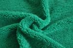 Green High-Quality Textile Material, Showcasing the Perfect Blend of Fashion and
