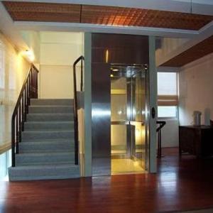 Quality 500-5000 Kg Capacity Screw Drive Elevator with Emergency Stop Protection and Low Maintenance wholesale