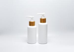 Quality 3.3OZ 4OZ boston round opal white glass bottles with real bamboo-plastic lotion pump, skincare packaging wholesale wholesale