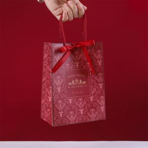 Quality Cattle Paperboard Custom Kraft Paper Handbag Cosmetics Packaging Gift Bags With Cowhide Rope wholesale