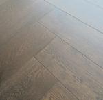dark stained White Oak herringbone/fishbone engineered wood flooring