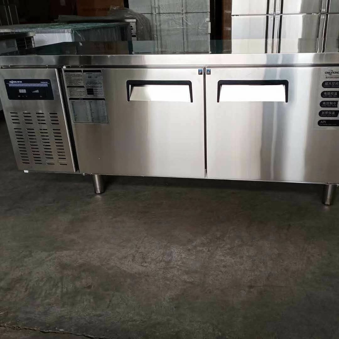 Stainless steel commercial refrigerator workbench in the back kitchen of hotel restaurant 9