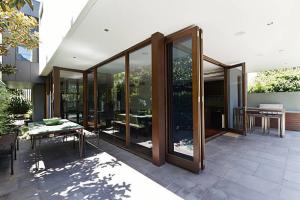 Quality Aluminum Windproof Folding Door Heat-insulating Glass Door Soundproof Patio Door Waterproof Sliding Door wholesale
