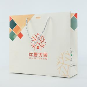 Quality Boutique Shopping Clothes Custom Logo Paper Bag Printed White With Ribbon Handle wholesale