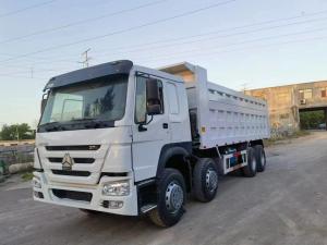 China Used Fuel Trucks White Color Left Hand Drive 8×4 Drive Mode 371 Horsepower Used HOWO Dump Truck on sale