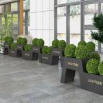 Outdoor large public chair with metal black planter pot