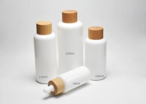 Quality Jade White 40, 100, 120ml Boston Round Opal Glass Bottles With Wooden-Plastic Clousures, Glass Primary Medical Packaging wholesale