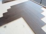 dark stained White Oak herringbone/fishbone engineered wood flooring