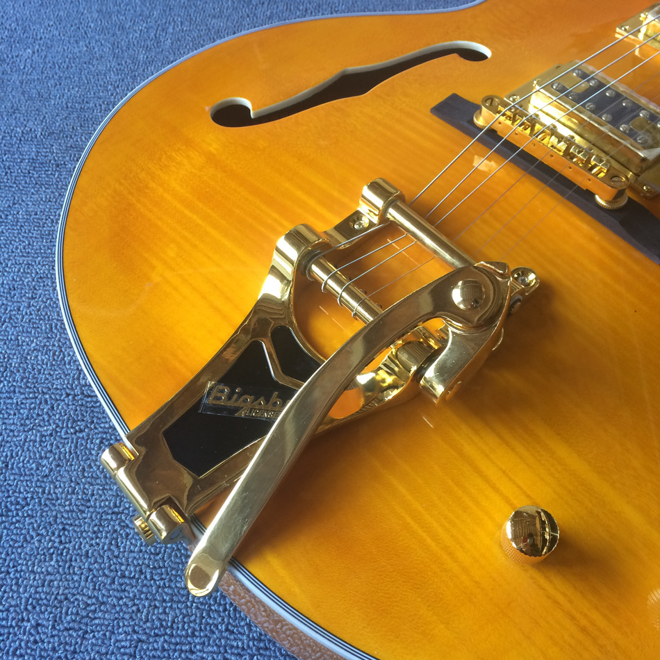 New style high-quality hollow body jazz electric guitar, Double F holes,Tremolo system ,Flame Maple top