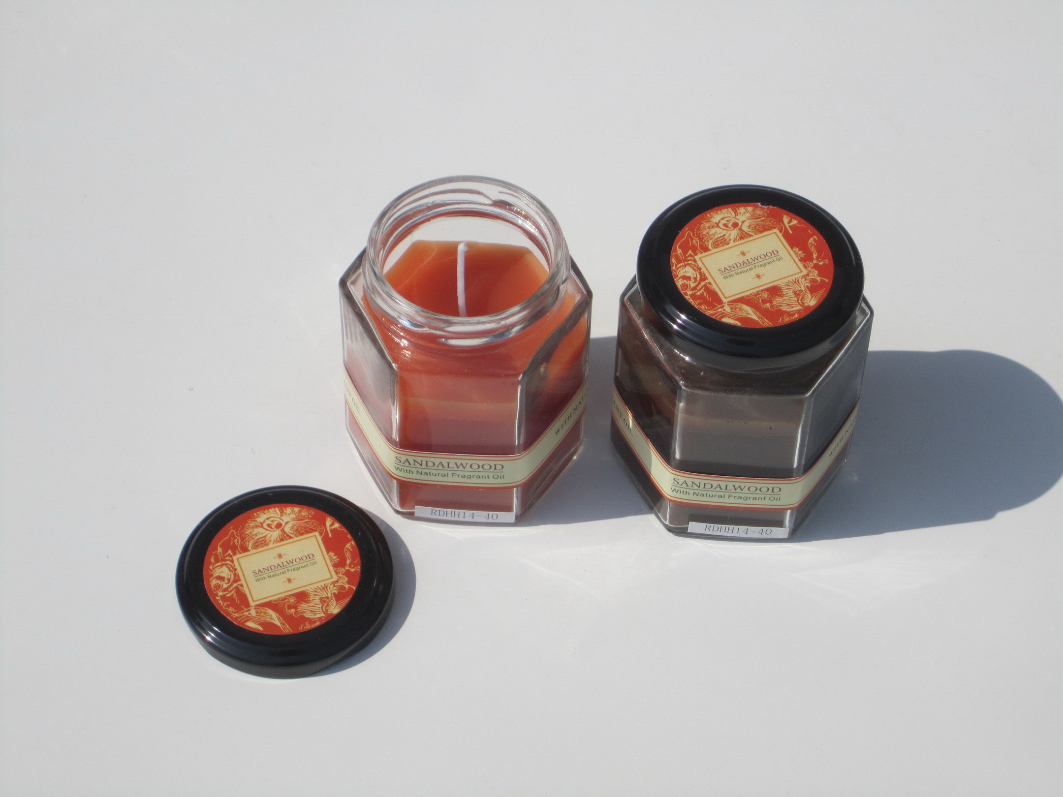 Orange & Brown scented hexagon glass jar candle with printed label decor